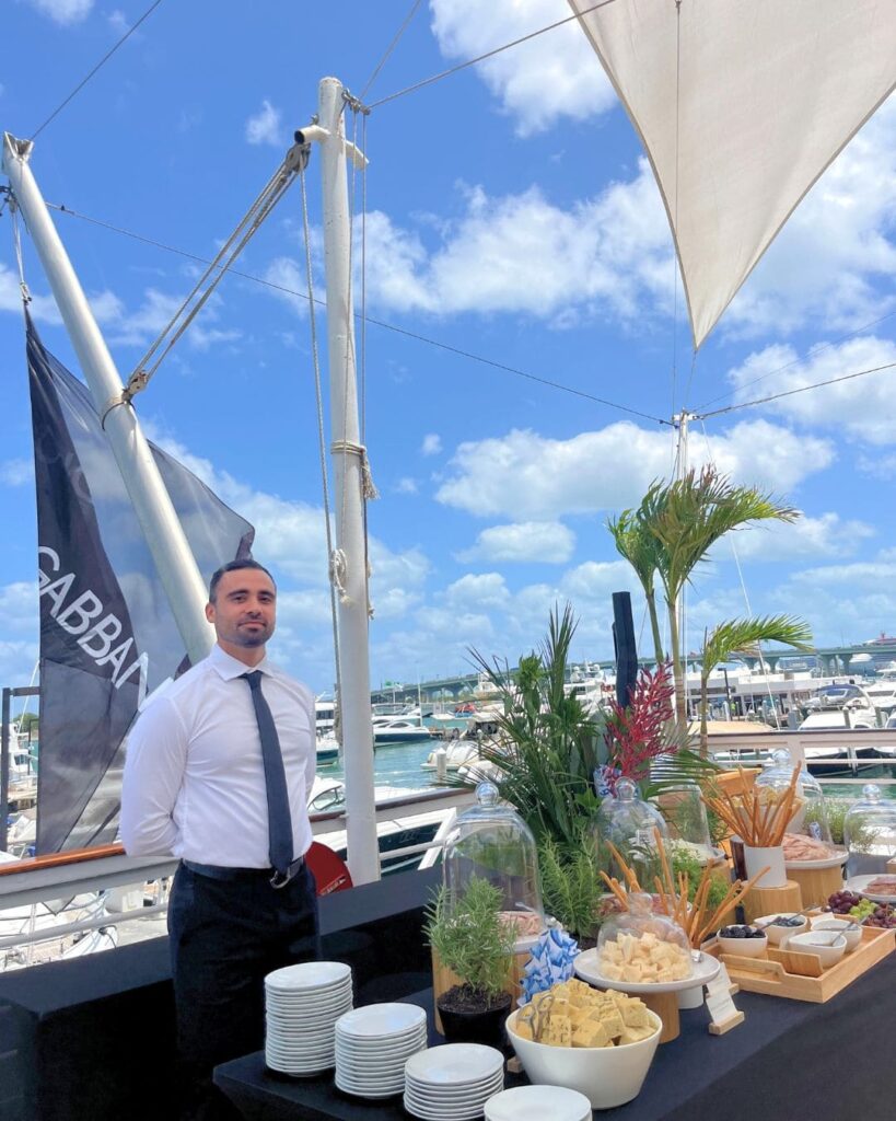 Elegant UCD antipasto buffet with Dolce & Gabbana branding at The Vessel Miami