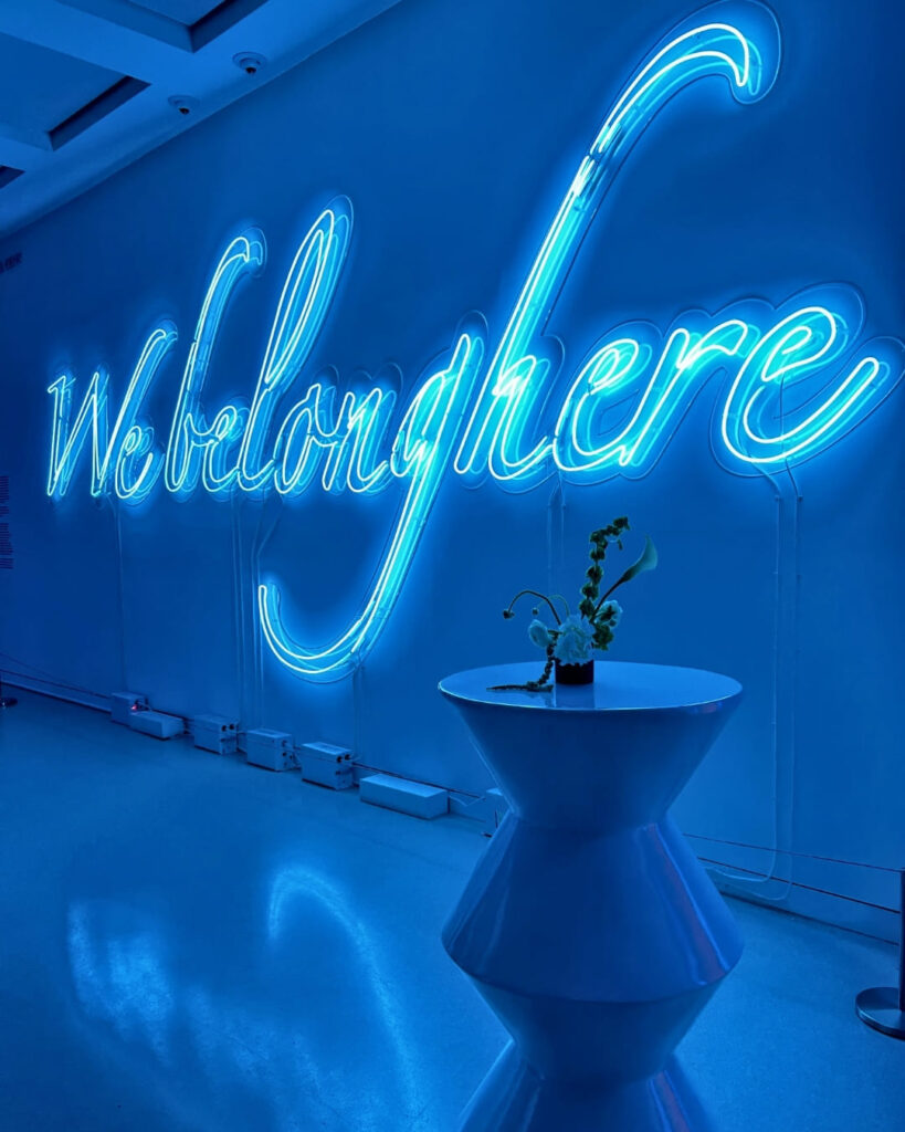 Neon “We Belong Here” art installation at The Bass dinner event