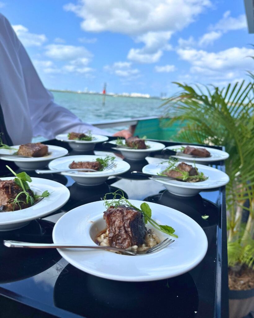 Braised short rib over creamy risotto served on yacht terrace