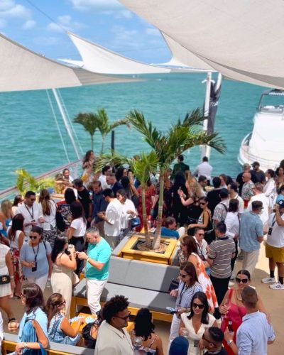 A Scene from The Vessel Miami Guests mingling on luxury yacht at Dolce & Gabbana Miami event