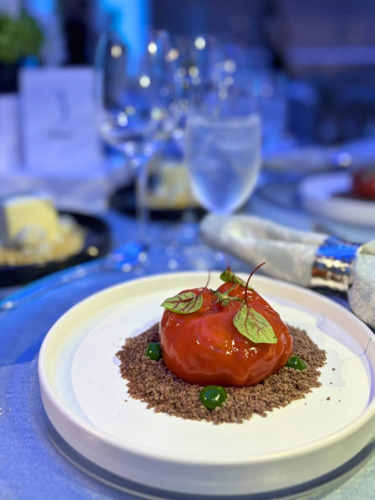 Reconstructed tomato panzanella starter on biscuit crumble at The Bass corporate dinner