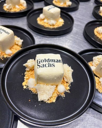 White cube dessert with Goldman Sachs logo White cube yuzu ganache dessert branded with Goldman Sachs logo